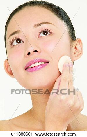 Stock Image - Lifestyles, Asian Ethnicity, Applying, Inner Beauty, One Young Woman Only. Fotosearch