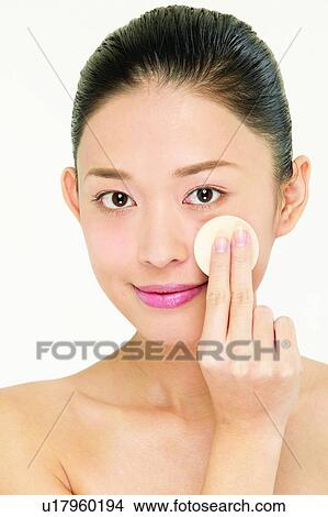 Picture - Young Adult, Body Care, Well Being, Powder Puff, Smiling, Asian Ethnicity. Fotosearch