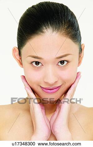 Stock Image - Beautiful, Black Hair, Beauty, Smirking, Inner Beauty. Fotosearch
