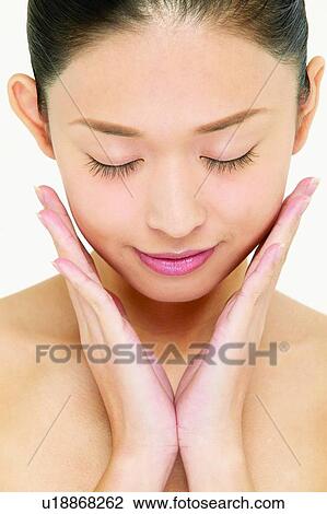 Close-Up, Beauty, One Young Woman Only, Head And Shoulders View Large Photo Image Stock Image - Close-Up, Beauty, One Young Woman Only, Head And Shoulders. Fotosearch