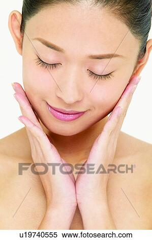 Stock Photography - East, Close-Up, Cheek, Asian, Asian Ethnicity, One Young Woman Only, Beauty. Fotosearch