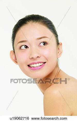 Stock Photograph - White Background, Joy, Indoor, Head And Shoulders, Beautiful, Eastern, Asian. Fotosearch