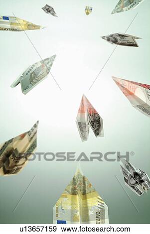 Close-Up, Folded, Flying, European Union Currency, Airplane View Large Photo Image Stock Photo - Close-Up, Folded, Flying, European Union Currency, Airplane. Fotosearch