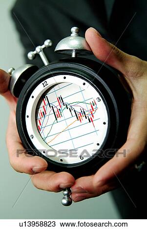 Close-Up, Human Hand, Holding, Graph, Alarm Clock View Large Photo Image Stock Image - Close-Up, Human Hand, Holding, Graph, Alarm Clock. Fotosearch