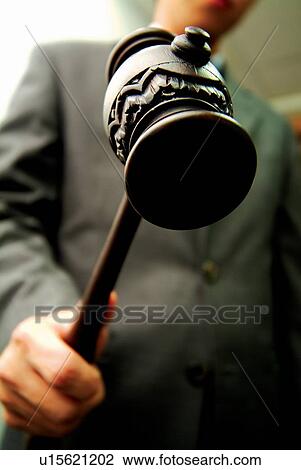 Stock Image - Holding, Mallet, Leadership, Finance. Fotosearch
