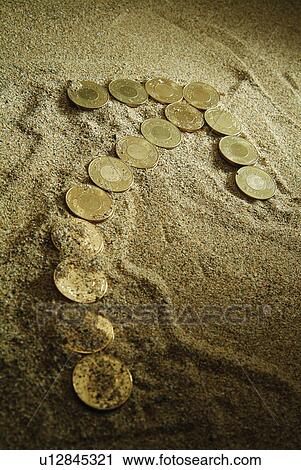 Stock Image - Investments, In A Row, Sand, Group Of Objects. Fotosearch
