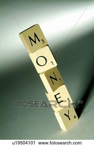 Stock Image - Shadow, Ideas, Close-Up, Capital Letter, Tilt, Investments. Fotosearch