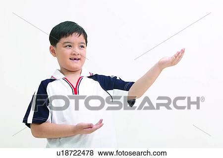 Stock Photo - Body Language, Casual Clothing, One Child Only, Childhood, Close-Up. Fotosearch