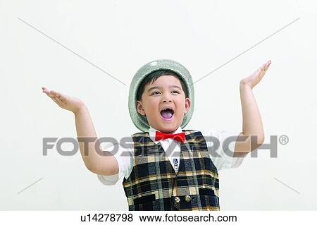 Stock Photo - Bow Tie, Arms Raised, Body Language, Black Hair, Asian Ethnicity, Cheerful, 6-7 Years. Fotosearch