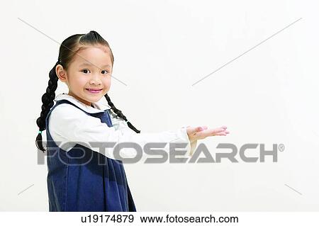 Braids, Arm Outstretched, Body Language, Black Hair, Asian Ethnicity, Casual Clothing, 6-7 Years View Large Photo Image Stock Photo - Braids, Arm Outstretched, Body Language, Black Hair, Asian Ethnicity, Casual Clothing, 6-7 Years. Fotosearch