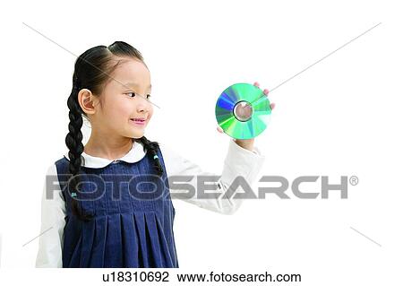 Stock Image - Casual Clothing, Asian Ethnicity, Braids, Body Language, Black Hair, CD, 6-7 Years. Fotosearch