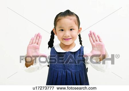 Stock Photo - Casual Clothing, Asian Ethnicity, Braids, Body Language, Black Hair, Child, 6-7 Years. Fotosearch