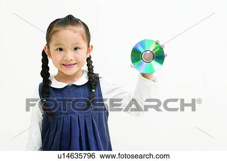 Stock Photograph - Casual Clothing, Asian Ethnicity, Braids, Body Language, Black Hair, CD, 6-7 Years. Fotosearch