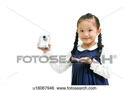 Stock Photograph - Casual Clothing, Asian Ethnicity, Braids, Body Language, Black Hair, Child, 6-7 Years. Fotosearch