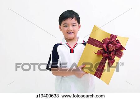 Stock Image - Casual Clothing, Indoor, One Boy Only, Close-Up, Cut Out. Fotosearch
