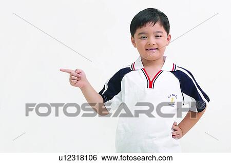 Stock Photograph - Cheerful, Asian Ethnicity, Casual Clothing, Body Language, Black Hair, Child, 6-7 Years. Fotosearch