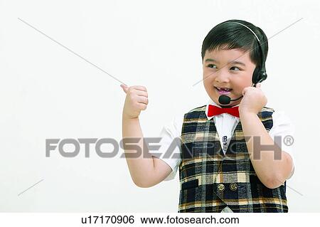 Child, Bow Tie, Body Language, Close-Up, 6-7 Years, Black Hair View Large Photo Image Stock Photograph - Child, Bow Tie, Body Language, Close-Up, 6-7 Years, Black Hair. Fotosearch