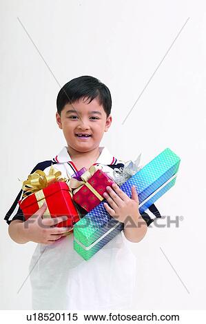 Stock Photography - Child, Celebration, Anticipation, Close-Up. Fotosearch