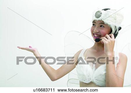 Fairy Costume, Holding, Cheerful, Artificial Wing, Fairy Tale View Large Photo Image Stock Image - Fairy Costume, Holding, Cheerful, Artificial Wing, Fairy Tale. Fotosearch