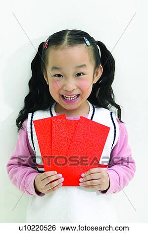 Stock Photograph - Looking At Camera, Black Hair, Close-Up, Cards, Cut Out, Elementary Age. Fotosearch