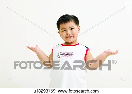 Stock Photo - One Person, 6-7 Years, Arm Outstretched, Cut Out, Indoor. Fotosearch