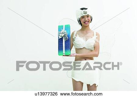 Stock Photograph - Portrait, One Object, Anticipation, Asian Ethnicity, Black Hair, Kids Body Language, Kids. Fotosearch