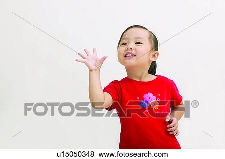 Standing, Gesturing, Close-Up, Smiling, Waist-Up View Large Photo Image Stock Photo - Standing, Gesturing, Close-Up, Smiling, Waist-Up. Fotosearch