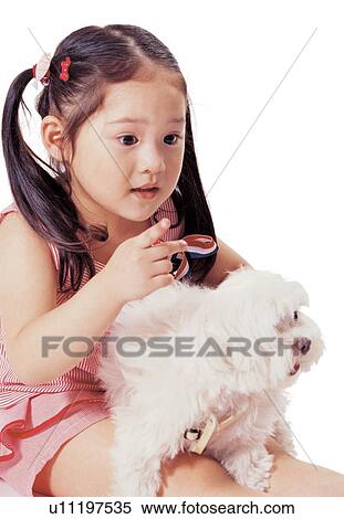 Stock Photography - animal, care, asian ethnicity, 4-5 years. Fotosearch