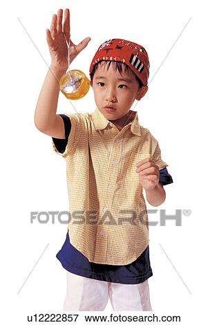 Stock Photo - asian ethnicity, bandana, background, 5-6 years. Fotosearch