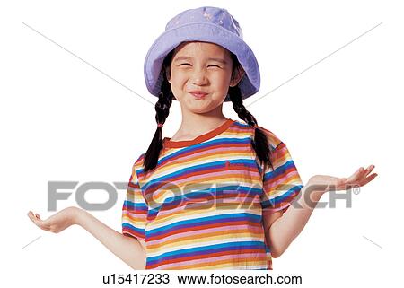 Stock Image - background, culture, making a face, hat, girl. Fotosearch