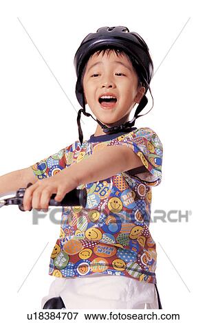 boy, culture, expression, helmet, playful, cycling helmet, child View Large Photo Image Stock Photo - boy, culture, expression, helmet, playful, cycling helmet, child. Fotosearch