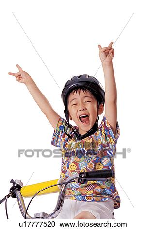 Stock Image - boy, waist up, hands in air, expression, smiling, child. Fotosearch