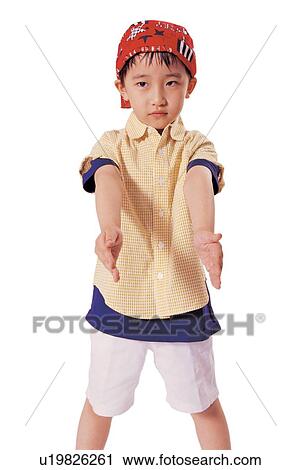 Stock Image - expression, asian ethnicity, looking away, human cutouts, culture, stance, child. Fotosearch