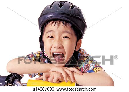 Stock Image - happiness, boy, cycling helmet, lifestyle, child, helmet. Fotosearch