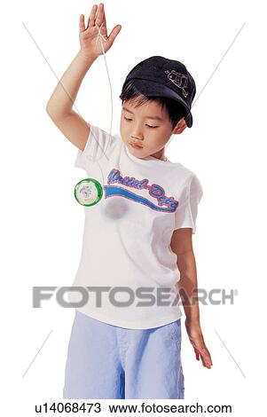 Stock Image - human cutouts, one person, lifestyle, yo-yo, expression, hand in air. Fotosearch
