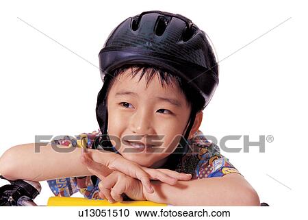 indoor, helmet, emotion, playful, cycling helmet, child View Large Photo Image Stock Image - indoor, helmet, emotion, playful, cycling helmet, child. Fotosearch