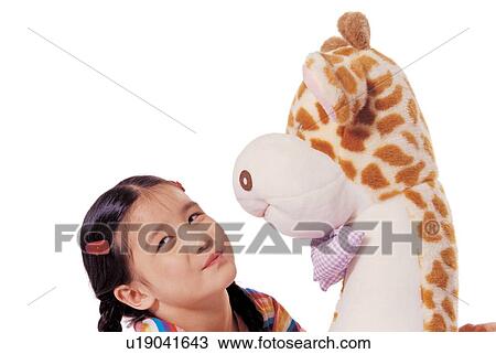 Stock Image - lifestyle, happy, background, toy, happiness. Fotosearch