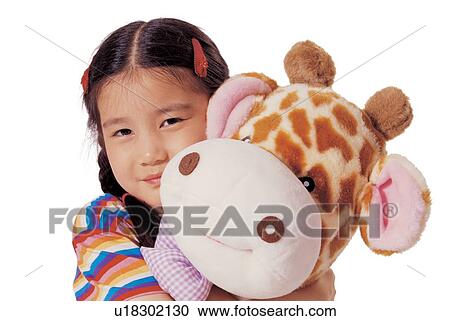 stuffed toy, toy, embracing, 5-6 years, giraffe, white background View Large Photo Image Stock Image - stuffed toy, toy, embracing, 5-6 years, giraffe, white background. Fotosearch