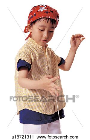 Stock Image - white background, half length, human cutouts, child, holding, indoor. Fotosearch