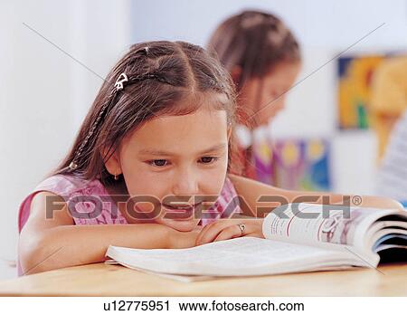 Stock Image - book, brown hair, casual. Fotosearch