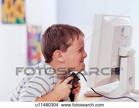 Picture - boy, brown hair, carefree, casual. Fotosearch