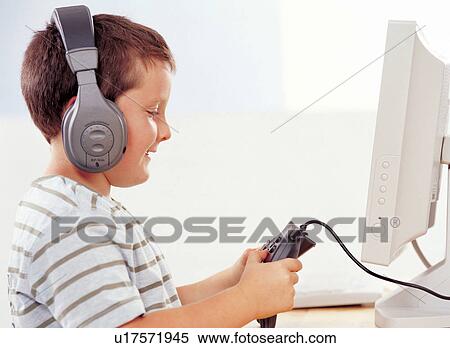 Stock Photography - boy, brown hair, carefree, casual. Fotosearch