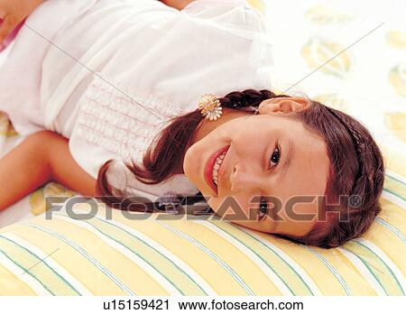 Stock Image - braid, brown hair, carefree, casual. Fotosearch