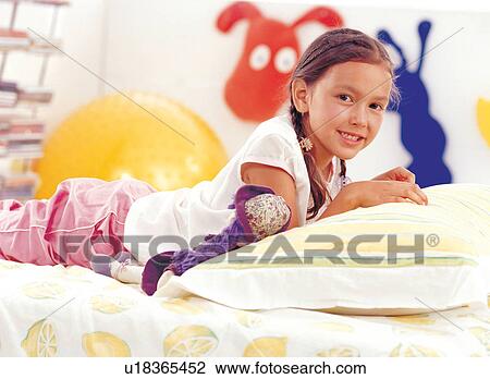 Stock Image - braid, brown hair, carefree, casual. Fotosearch