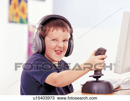 close-up, boy, carefree, children's wear, t-shirt, headphones, emotion View Large Photo Image Stock Image - close-up, boy, carefree, children's wear, t-shirt, headphones, emotion. Fotosearch