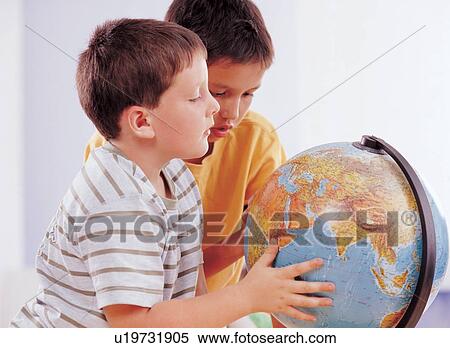 human face, globe, expression, kids, two people, innocence View Large Photo Image Stock Photography - human face, globe, expression, kids, two people, innocence. Fotosearch