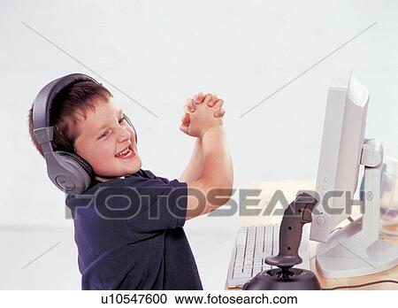 Stock Image - indoor, close-up, childhood, smiling, innocence. Fotosearch