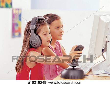 together, brown hair, game, girls, friend, two people View Large Photo Image Stock Photo - together, brown hair, game, girls, friend, two people. Fotosearch