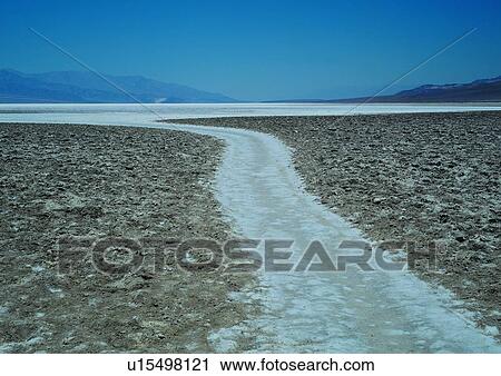 Stock Image - Barren, Day, Ground, Uncultivated, Outdoor, Blue, Dry. Fotosearch