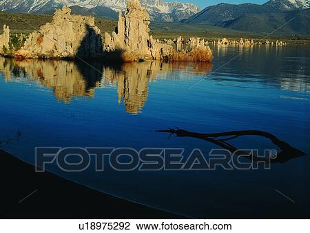 Stock Image - Rugged, Shadow, Rocky, Water, Travel Destinations. Fotosearch